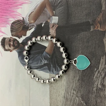 

SHINETUNG S925 Sterling Silver enamel green heart tag 8mm ball bead bracelet, 1: 1 high-end women's jewelry with logo.