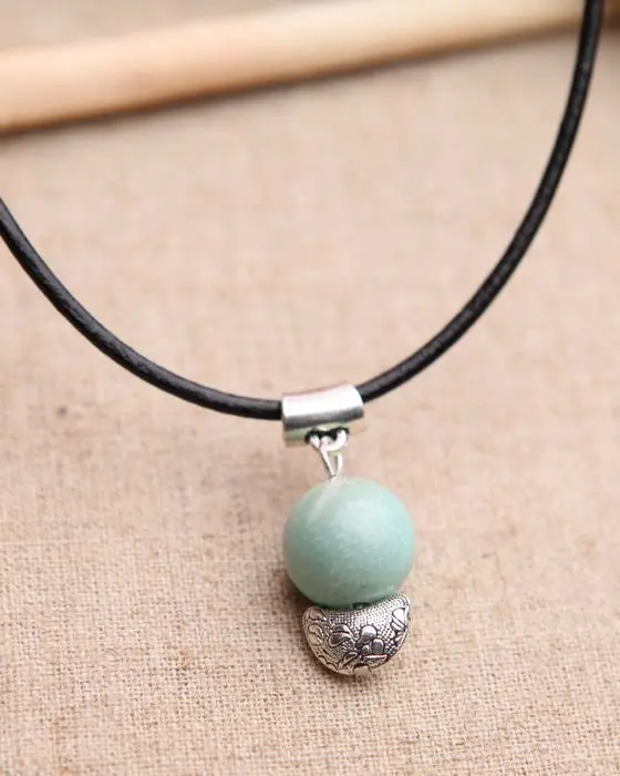 

Natural Amazon Stone Amazonston Varved Tibetan Silver Black And White with Pattern Leather Rope Necklace Adjustable Size