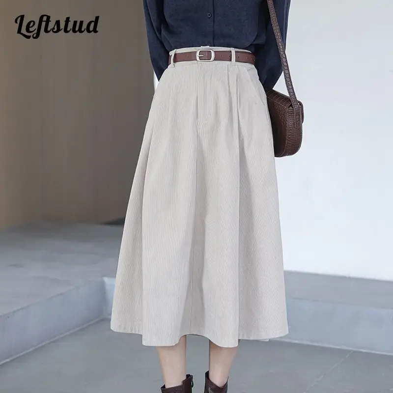 Corduroy casual simple solid color skirt 2022 spring new Korean A-line mid-calf skirt women high waist with belt