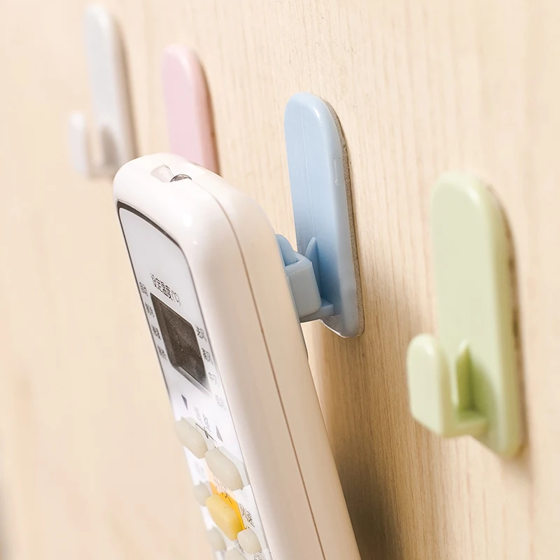 

4pcs! High quality Self Adhesive Plastic Hooks Holder Remote Control Sticky Hook Hanger TV Air Conditioner Key Wall Storage.