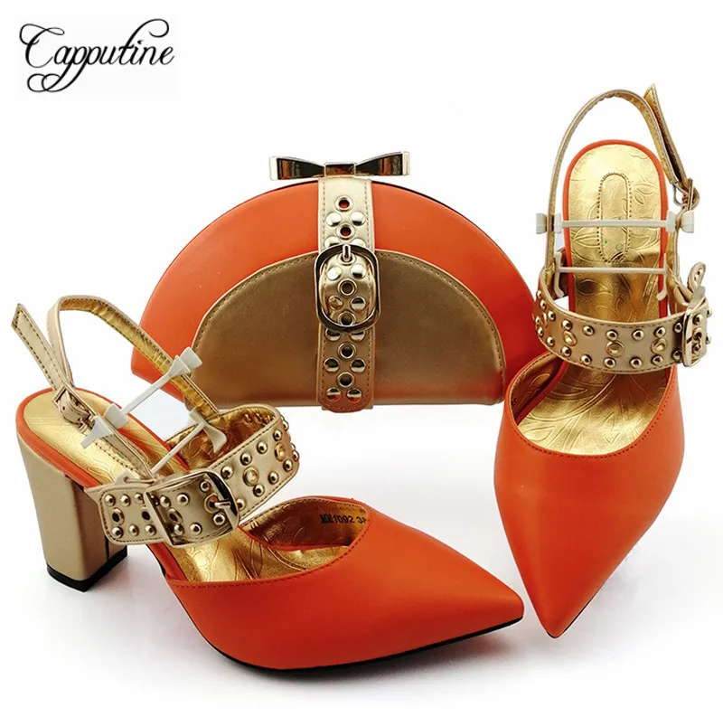 orange sandals and matching bag