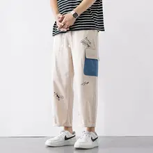 Японский уличная мода брюки карго для мужчин Harajuku граффити мешковатые широкие брюки повседневные до щиколотки Брюки Одежда Белый Японский уличная мода брюки карго для мужчин Harajuku граффити мешковатые широкие брюки повседневные до щиколотки Брюки Одежда Белый