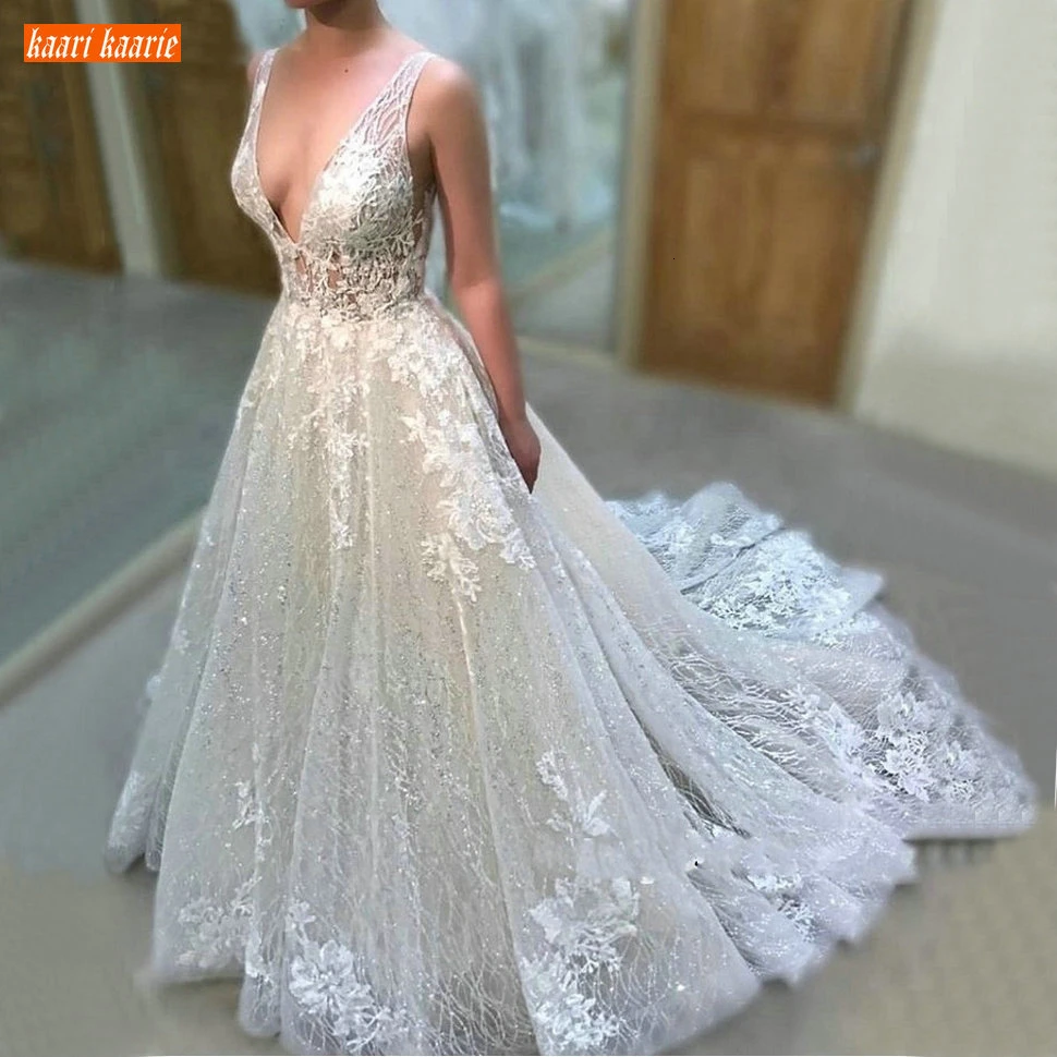 

Sumptuousl Boho White Deep V Neck Wedding Dresses Sleeveless Appliqued Tulle Beach Bridal Dress Princess Customized Wedding Gown