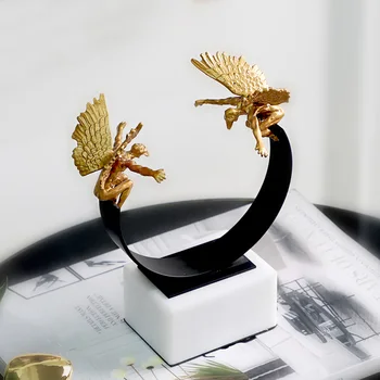 

Two Gold Angels Stand On A Semicircular Metal Balance Bracket Ornaments Modern Home Decor Marble Craft Ornaments Statues