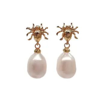 

Cultured White Rice Pearl Gold Plated Spider Stud Earrings