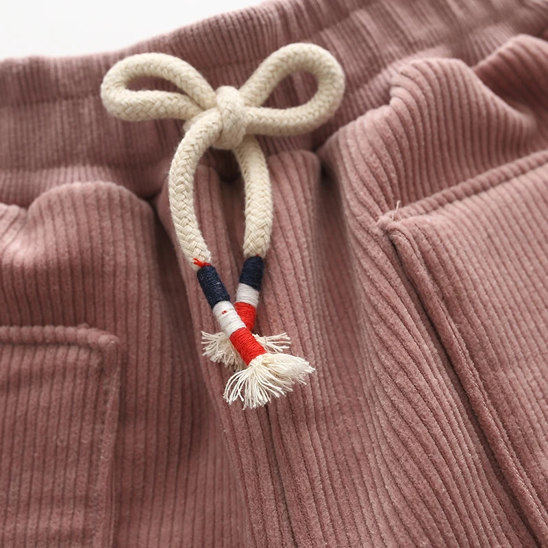 Manufacturers sell new autumn and winter zhongtong embroidery love elastic corduroy thickened trousers cotton trousers