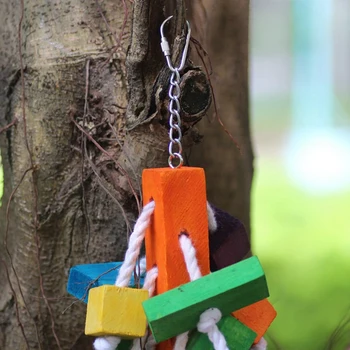 

Pet Bird Hanging Chew Bite Toy for Cage Decoration Parrot Ave Climbing Wooden Cotton Toy Coloful Wood Block Toy Bird Supplies