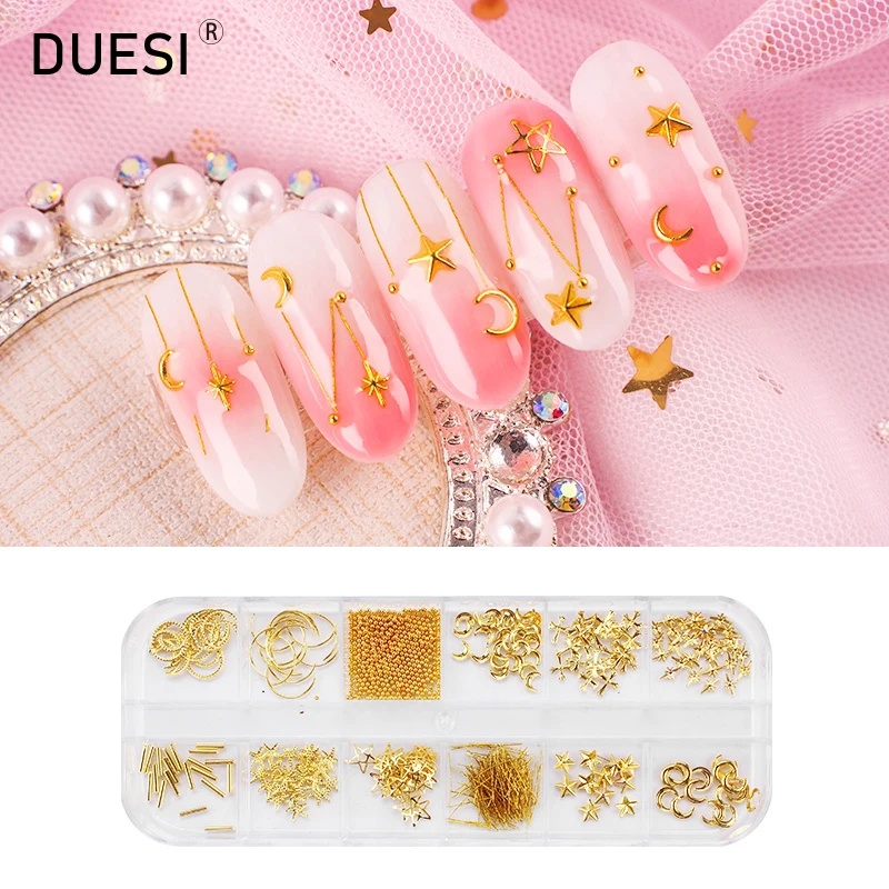 

DUESI 12 Grids 3D Nail Art Decorations Glitter Rhinestones Sequins Beads Metal Frame Shell Nail Decals Golden Silver DIY Decor