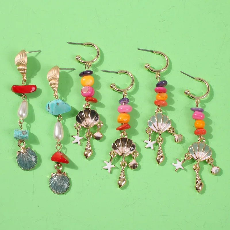 

European and American popular holiday style new earrings imitating pearl alloy shell color natural stone long earrings