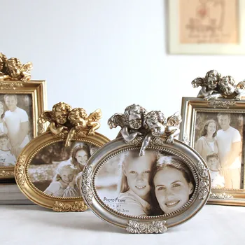 

6/7/8 Inch Cupid Gold Photo Frames Retro Handmade Sculpture Resin Oval Frame Creative Angel Wedding Desktop Decoration Ornaments
