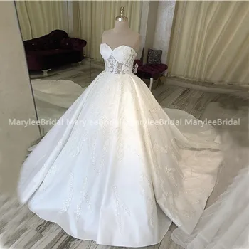 

Glamorous Ball Gown Wedding Dress Sweetheart Illusion Bodice Lace Appliques Princess Bridal Gowns Chapel Train robe de mariée