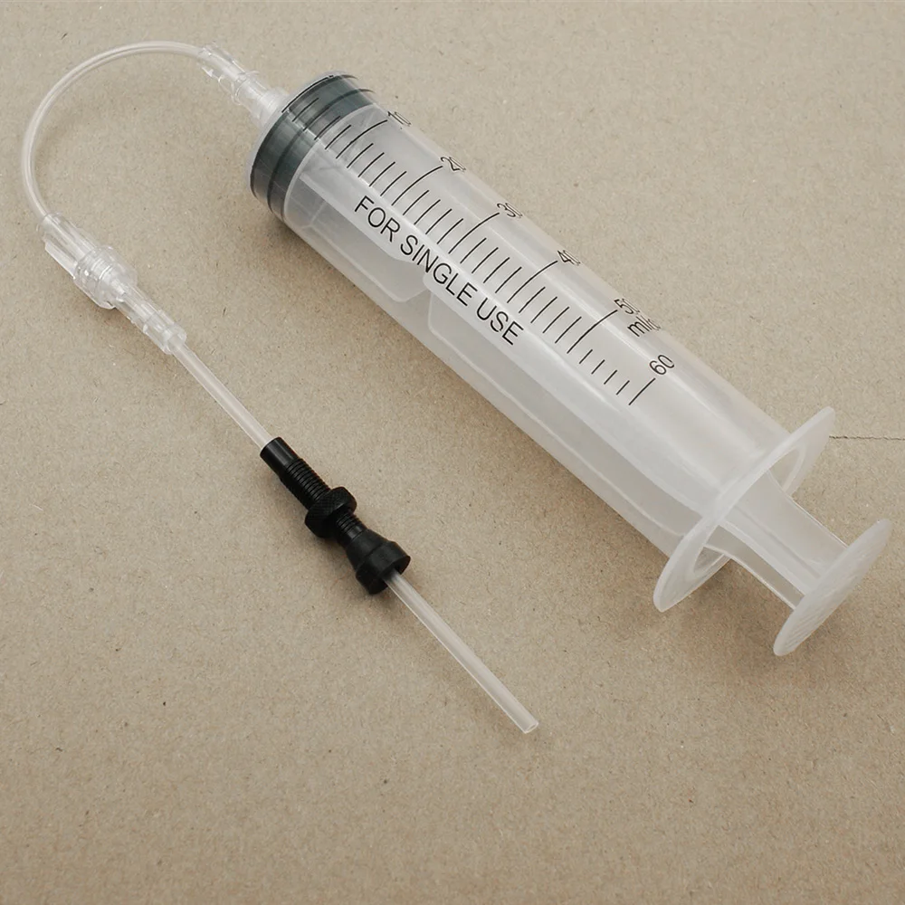 

Oil Tubeless Tire Sealant Injector Puncture Filling Repair Tool Bicycle Cycling