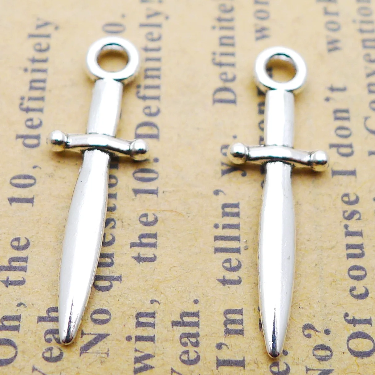 

Charms For Bracelet Making 30 Pieces 8x24mm Antique Silver Color Sword Charms