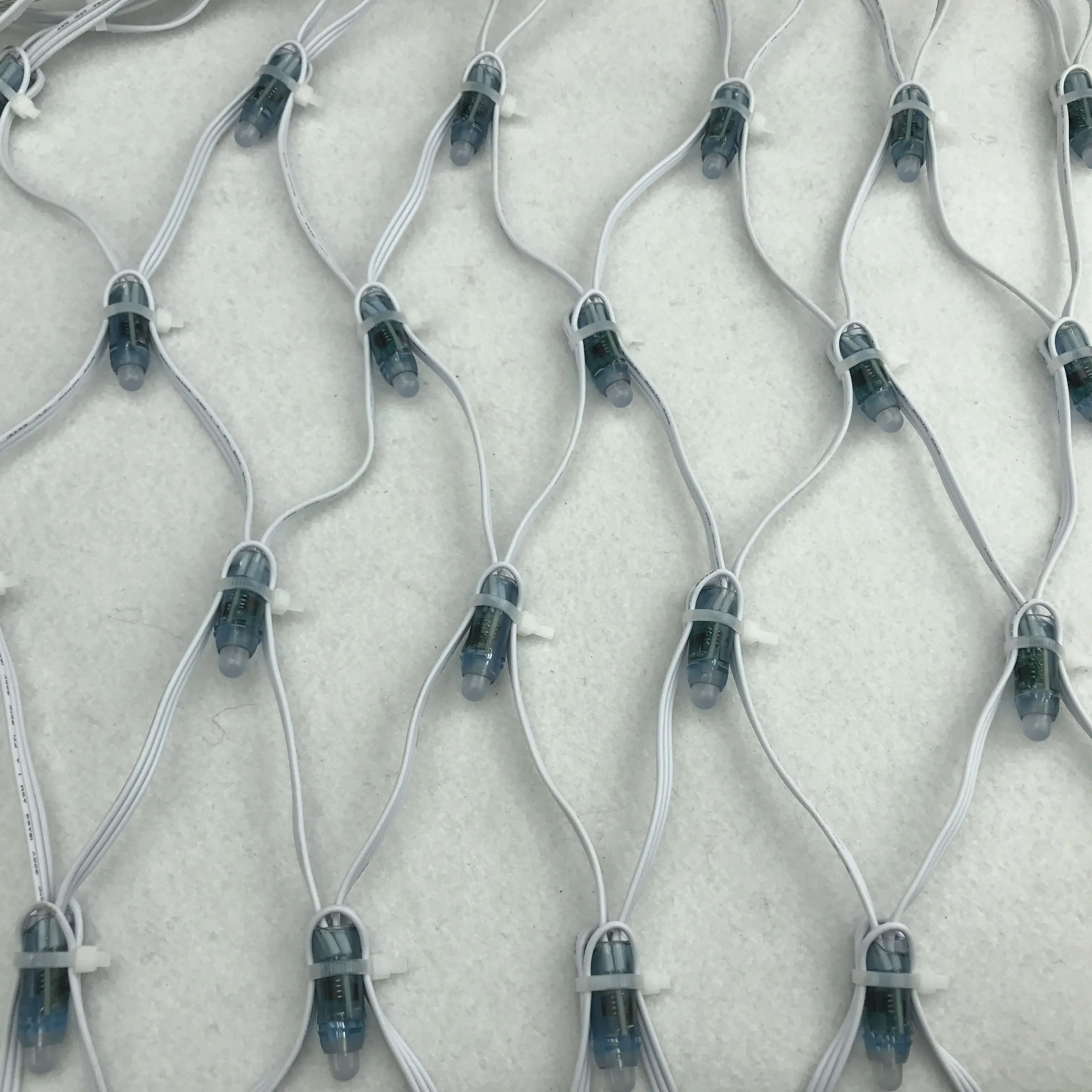 

Individually LED full color net pixel;DC12V WS2811 controlled;all WHITE wire;10leds(1m)*10leds(1m)