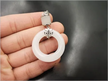 

Natural Xinjiang white jade safety ring pendant fox buckle inlaid safety ring pendant