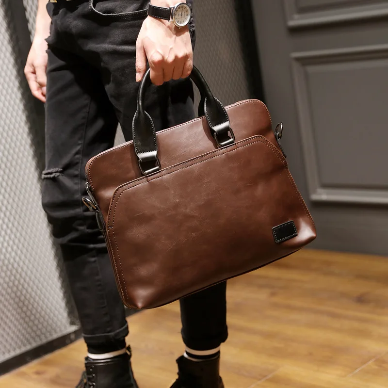 

Korean version of men's one-shoulder bag recreational handbag trend computer bag PU men's bag mad horseskin straddle