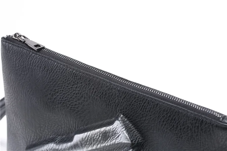 Personality pattern three-dimensional street leather wrist bag Korean version of fashionable men's hand bag