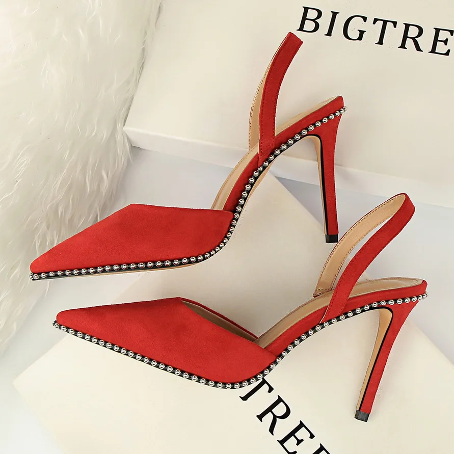 

2019 Spring And Summer New Pointed Back Empty Single Shoes Fashion Wild Rivets Stiletto Heels Baotou Girls Sandals