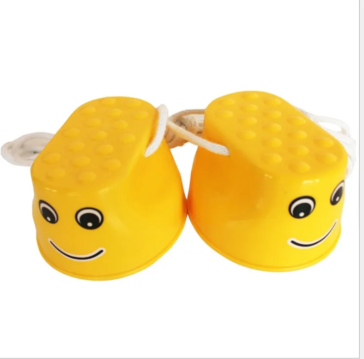 Running stilts children's potholes high-pitched high-barrel running doll plastic (yellow) |