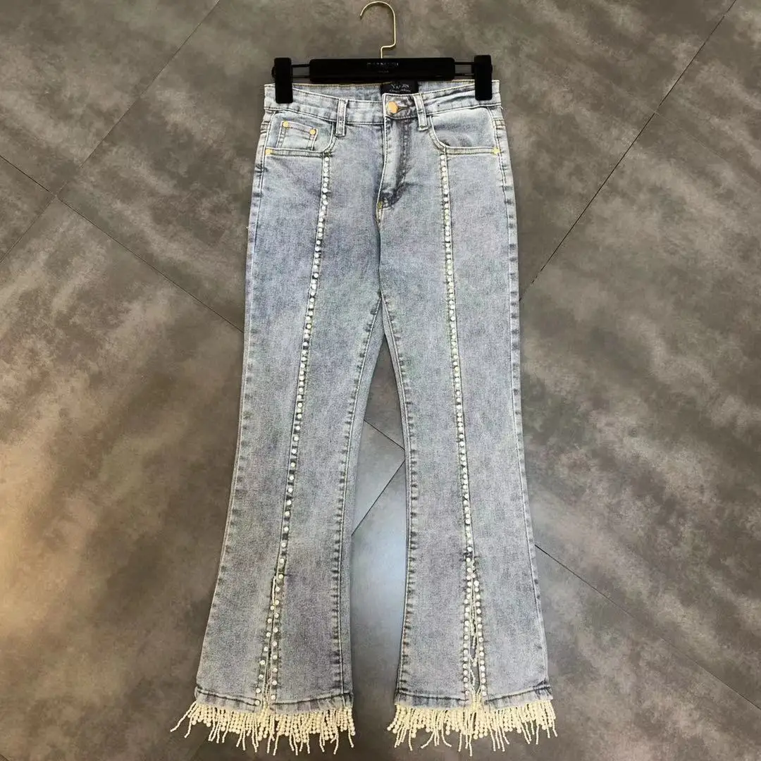 

2019 early autumn new beaded beaded tassels under the split micro-la jeans