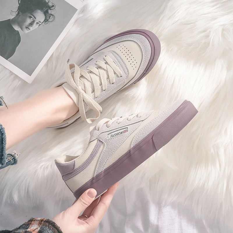 white soft leather trainers