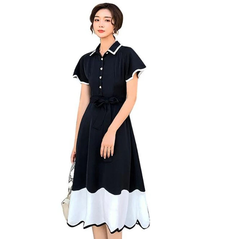 

2020 new retro French black and white with wave pendulum short sleeve color matching high waist mid-length lace dress