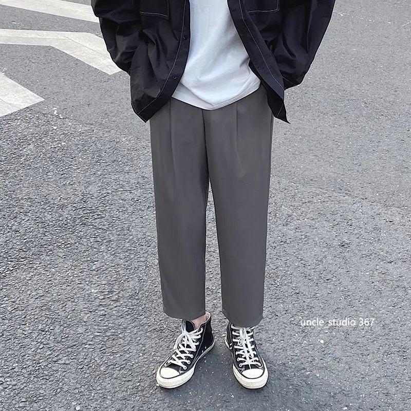 

Men's casual trousers 2020 spring and summer new solid color handsome nine points trousers young people fashion trend men's