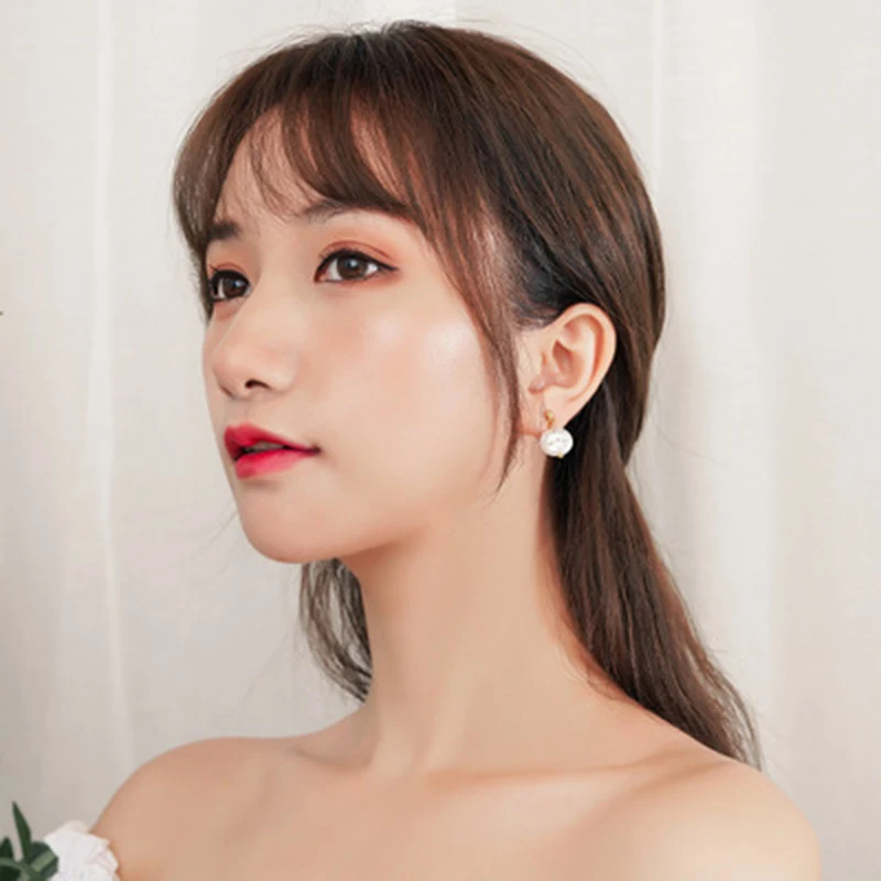 

Ins explosion models shell pendant ear pierced ear clip female temperament wild earrings