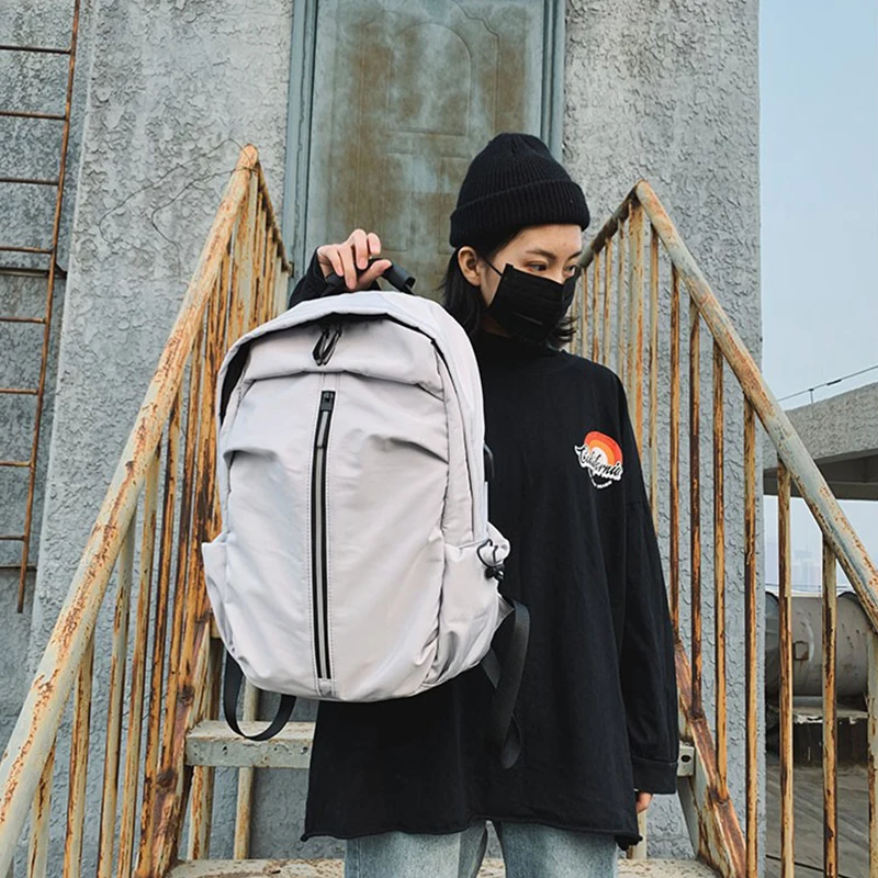 

Casual Backpack Unisex Sports Bag Travel Multifunctional Men And Women Bagpack Personality Reflective Simple White Couples Bag