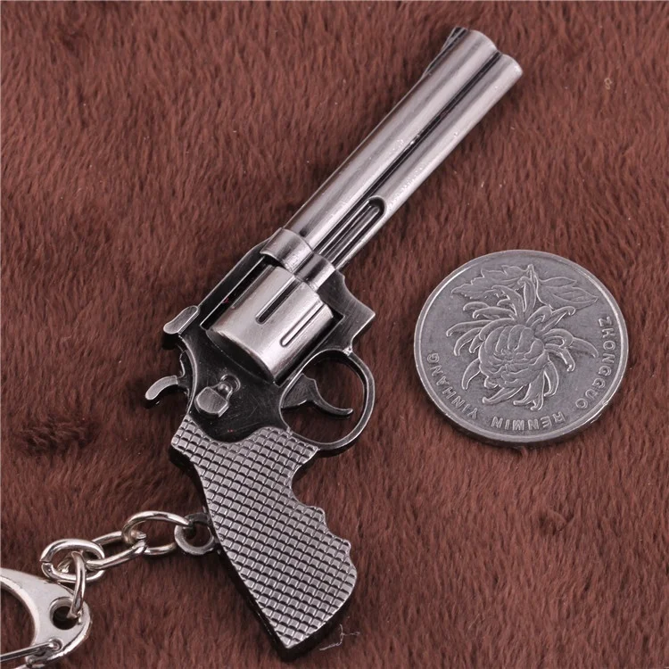 EUPNHY 1 шт. Забавный миниатюрный револьверный пистолет оружие брелок пистолет брелоки винтажный Мини Подвеска пистолет брелок для ключей держатель - Цвет: 2