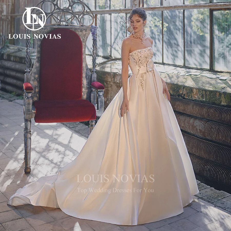 

Свадебное платье LOUIS NOVIAS, ТРАПЕЦИЕВИДНОЕ, без бретелек, с открытой спиной, со съемными цветами, с пышными рукавами, атласное свадебное платье