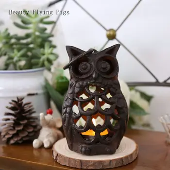 

Direct sales new creative retro cast iron owl candlestick home coffee romantic candlelight dinner props candlestick ornaments