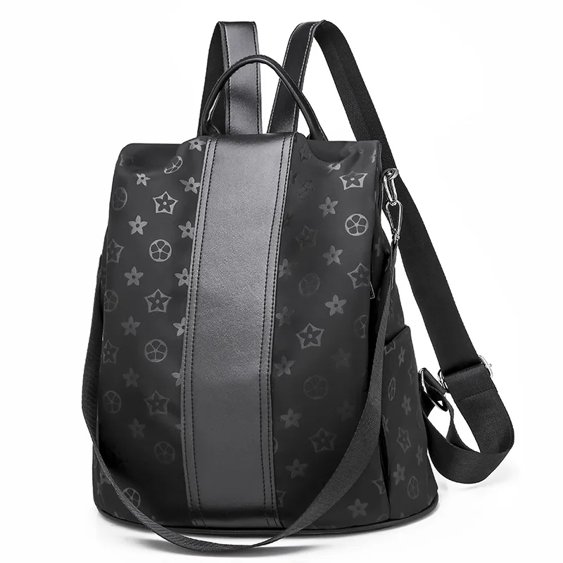 

Foreign trade wholesale New style Oxford cloth light lettered backpack women's versatile casual multi-functional anti-theft stud