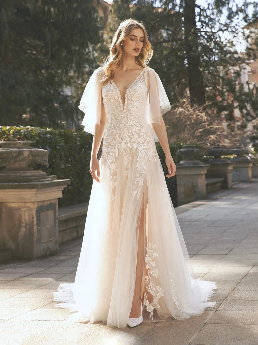 bohemian flutter sleeve wedding dress