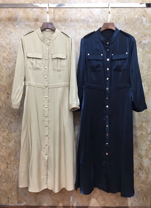 

2019 Early autumn new girl round collar symmetrical pocket button long sleeve solid color dress 816