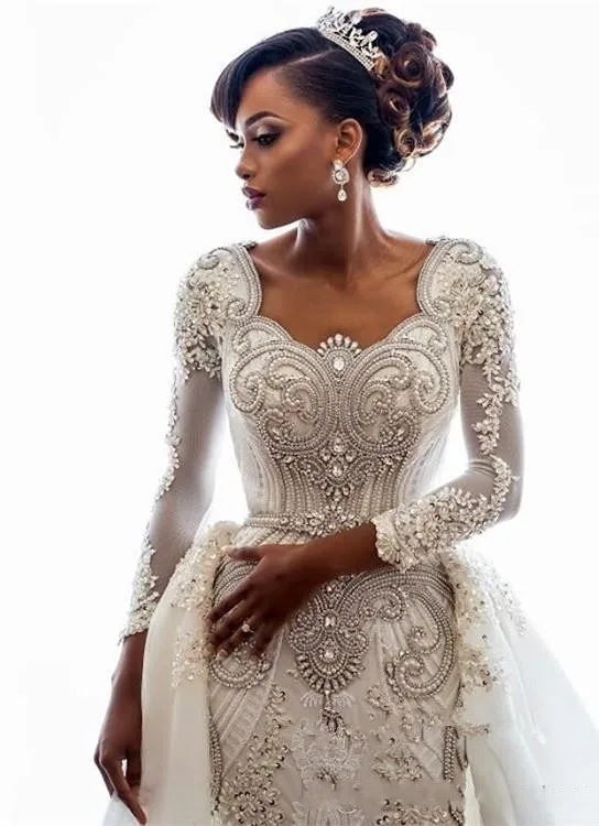2019 African Long Sleeves Lace Mermaid Wedding Dresses Scoop Neck Lace Applique Beaded Crystals Over Skirts Court Train Wedding Bridal Gowns