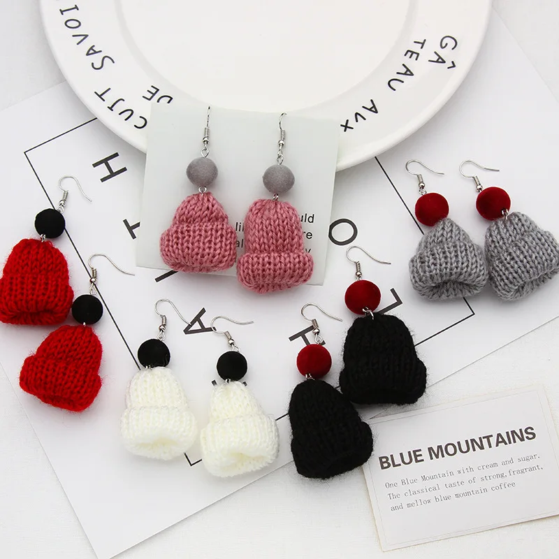 

Korean autumn and winter cute wool Christmas hat earrings temperament long wool ball earrings female