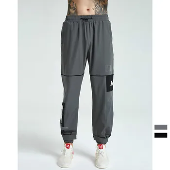 

2019 Autumn and Winter New Products Loose Beam Foot High Street Hit Color Men's Tooling Magic Trousers