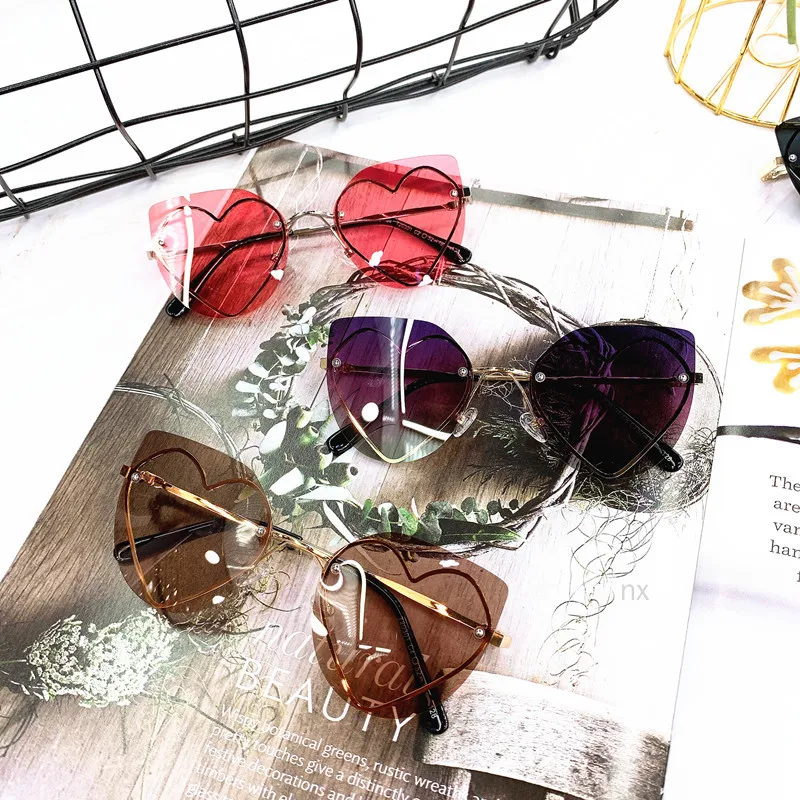 MINCL Brand Rimless Heart Sunglasses For Women Fashion Ladies Sun Glasses Love Heart Shaped Candy Glasses Girls UV400 NX