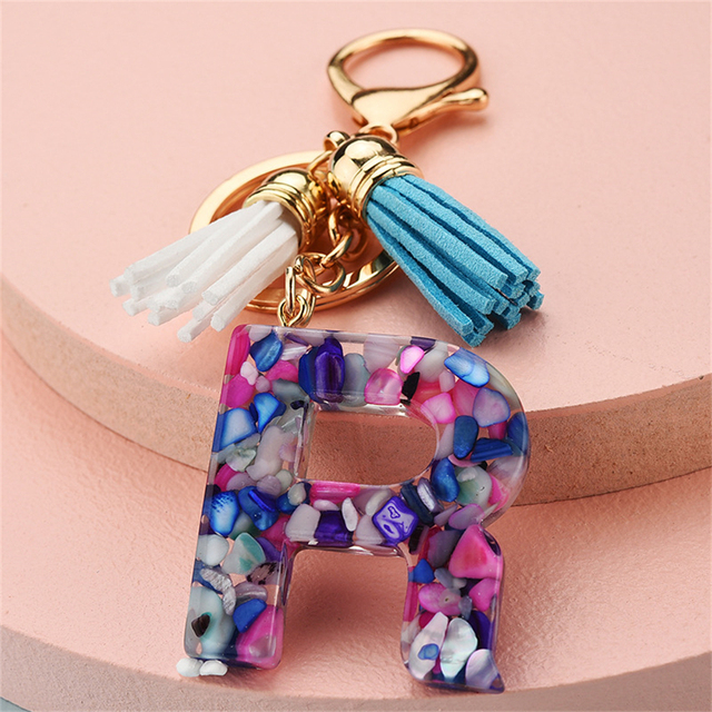 Women Keychains 26 Glitter Hollowed-out Words Handbag Tassel English Letter Keyring with Puffer Ball Charms Free Shipping