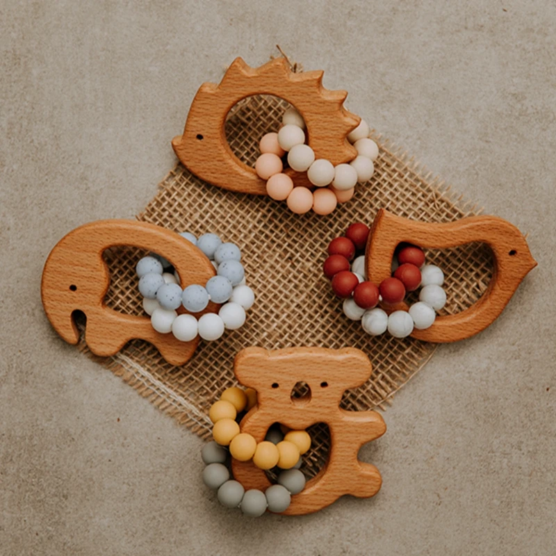 

Newborn Baby Toys Wooden Animals Teether Engraved Bead Crafts Ring DIY Crochet Beads Soother Bracelet For Baby Rattle Gifts