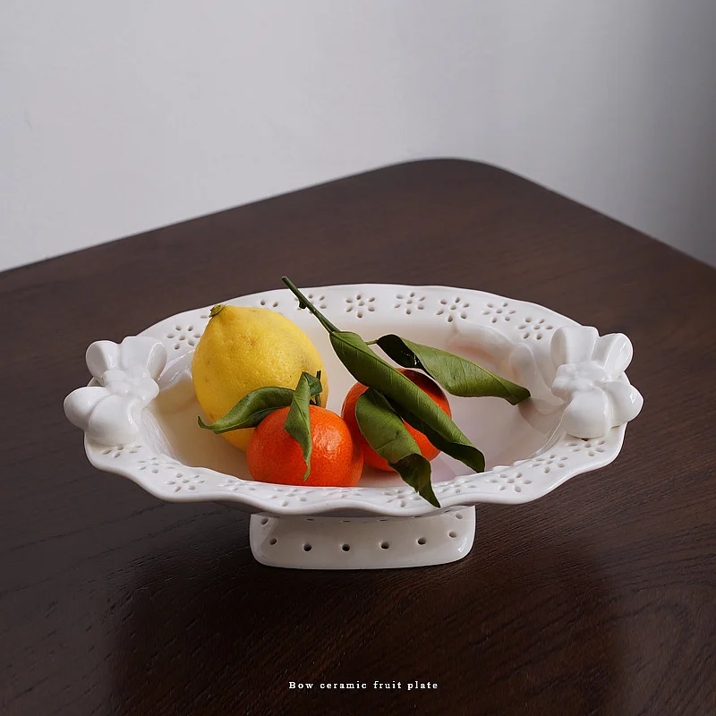 

European embossed three-dimensional high foot fruit plate lovely bow handle palace plate