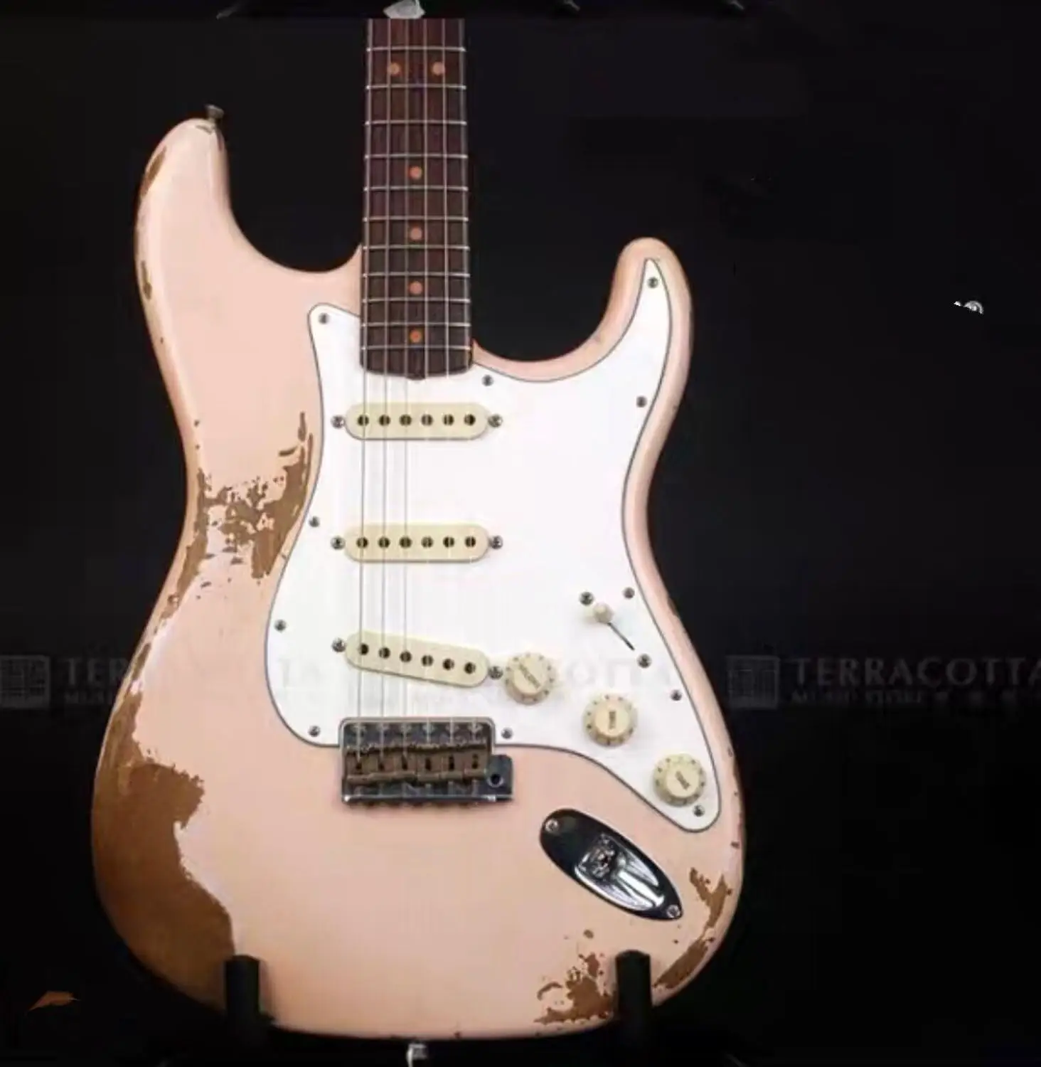 

new arrival electric guitar, high quality Chinese electric guitar with pink color , rosewood fingerboard , relics by hand guitar