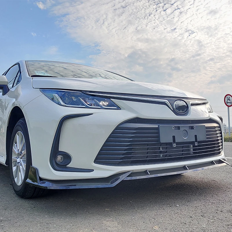 

Applicable to Toyota new Carlo modification pull front lip rear lip front shovel modification Corolla tail top wing shutters