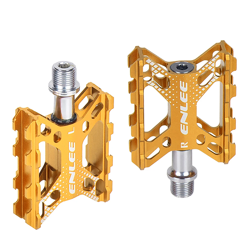 black and gold mountain bike pedals