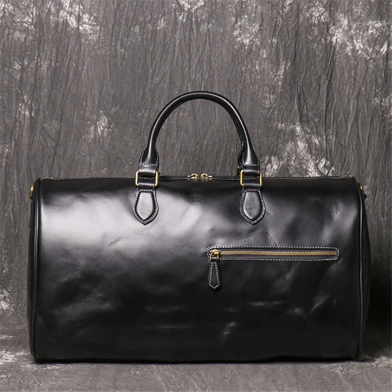 Color Black Front Display of Woosir Cowhide Duffle Overnight Bag