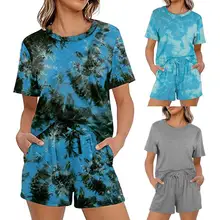 Conjunto de dos piezas formado por Top y pantalón corto, manga corta, cintura elástica, con bolsillos, para mujer