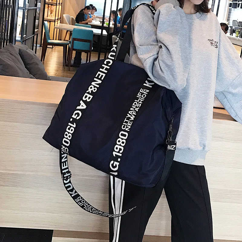 

Fashion large capacity Mommy bag letter Ribbon single shoulder oblique Span Women's bag