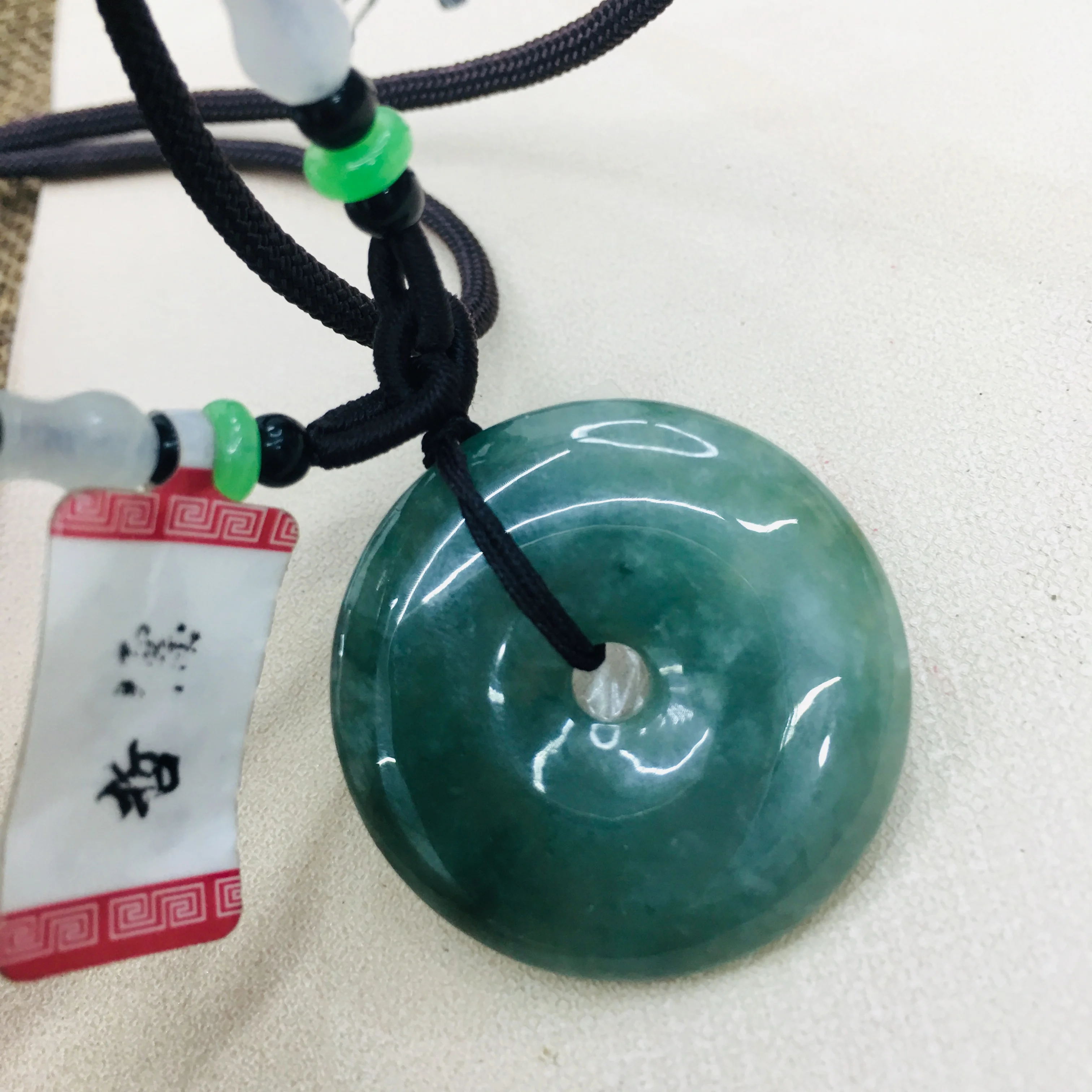 

Pure natural Emerald jade hand-carved oil green donut pendant with tri-color bead necklace men and women sweater chain