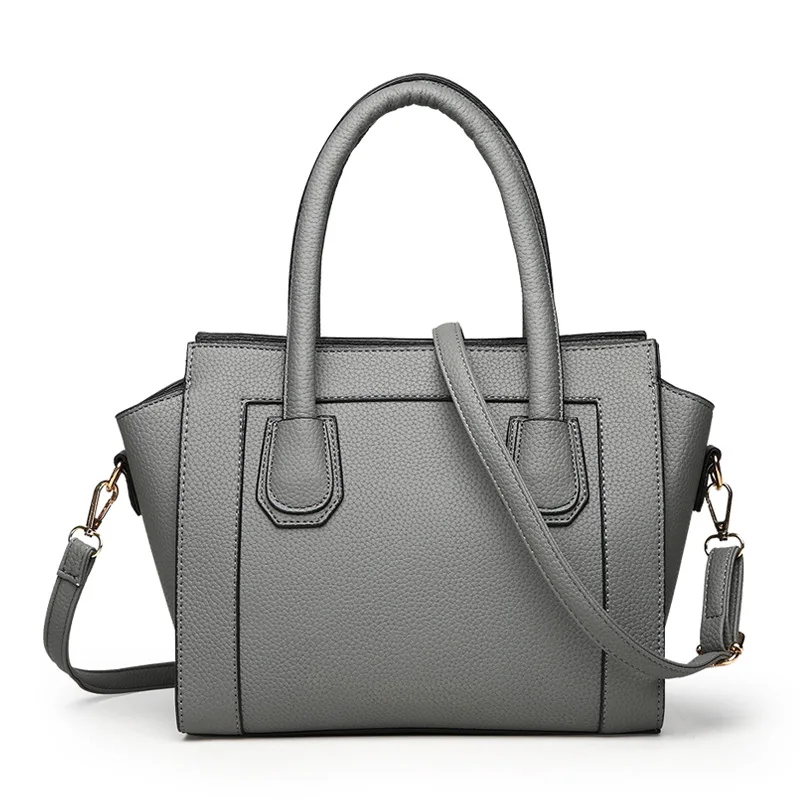 

2019 New Style Shell-Type Handbag Korean-style Fashion Rivet Shoulder Tassel Bag